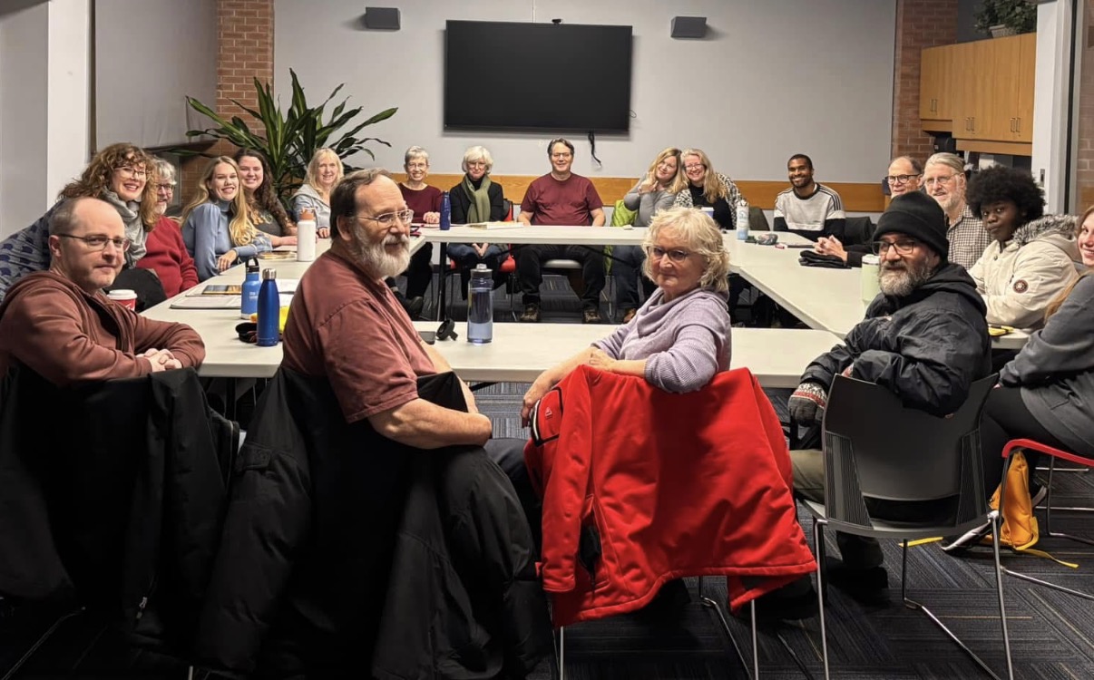 Artists gathered around a long table for an Anna Small Theatre Lab reading.
